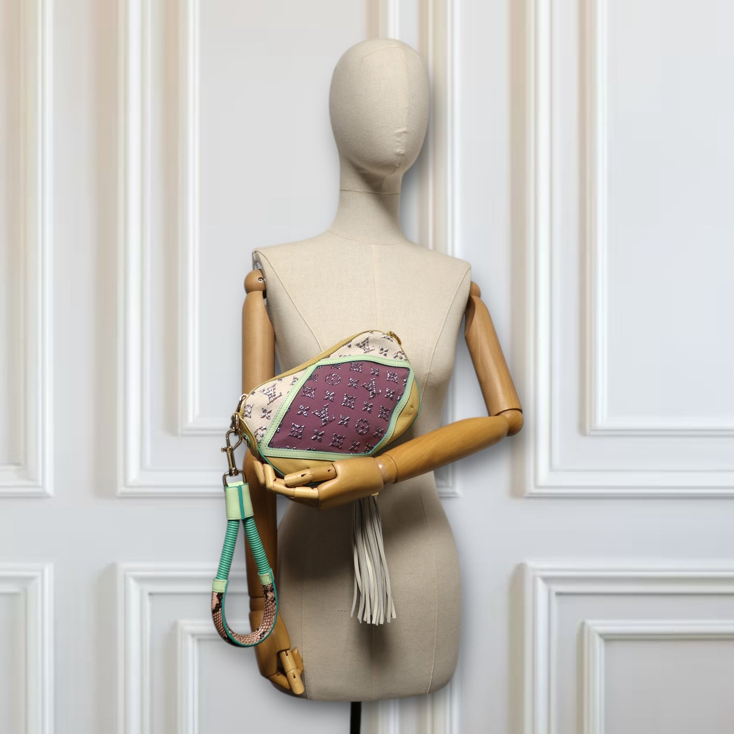 Louis Vuitton Nightbird Pochette clutch
