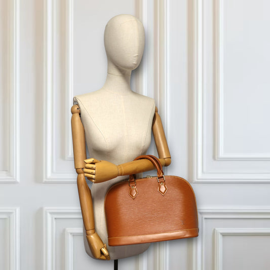 Louis Vuitton Alma epi Cipango gold