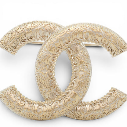 Chanel Brosche gold gemustert